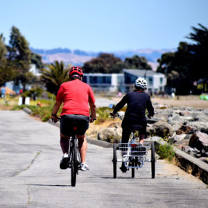 retired couple bicycling