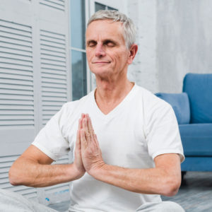meditating older man