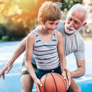 older adult staying active with younger child