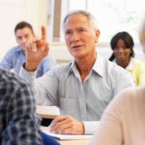 Older man taking college course